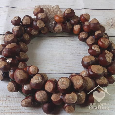 How to Make a Conker Wreath [DIY Craft for Autumn] My kids have had a great time collecting conkers and I'm making them into a conker wreath to decorate my home for autumn. Head over to my blog for full step by step instructions to make your own conker wreath for your fall decor. https://hearthearthcrafting.com/2021/10/22/how-to-make-a-conker-wreath-diy-craft-for-autumn/ #HeartHearthCrafting #CottageCore #NatureCrafts #NatureCraft #AutumnIsHere #AutumnDecor #Conkers #ConkerCrafts Crafts With Conkers, Cottagecore Fall Decor Diy, Conker Craft Ideas, Conker Wreath, Conkers Craft, Castle Crafts, Cottagecore Fall, Crafting Recipes, Material Wreaths