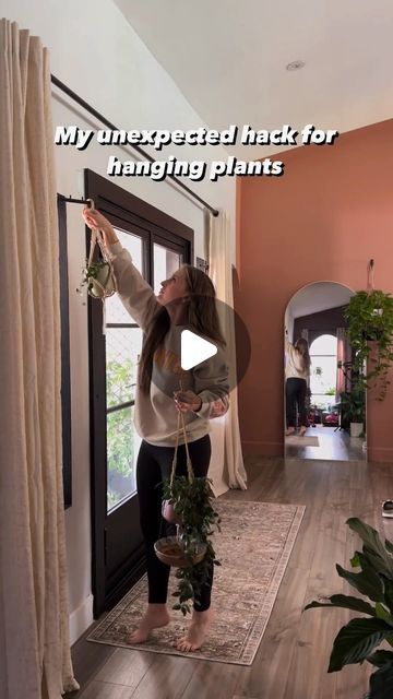 Chantel Gray | 🪴 Plants + DIY on Instagram: "Follow for more planty hacks 🤭 

As a human mom, and plant parent to over 250+ plants, I’ve often got to get creative with how to hang them. This is my FAV way so far!

Linked in bio under “plant essentials” or if it’s easier - comment “let’s hang out” and I’ll message you the link! It’s currently on sale as well for Prime Deal Days which is a huge plus!

Enjoy plant fam! xo - Chantel

p.s. Is this hack a hit or miss?!" Interior Hanging Plants Ideas, House Plant Placement, How To Hang Plants From Ceiling Diy, Indoor Hanging Plants Diy, Plant Hanging Ideas Diy, Plant Box Indoor, Plants In Living Room Ideas, Hanging Plants Indoor Ideas, Plant Corner Ideas