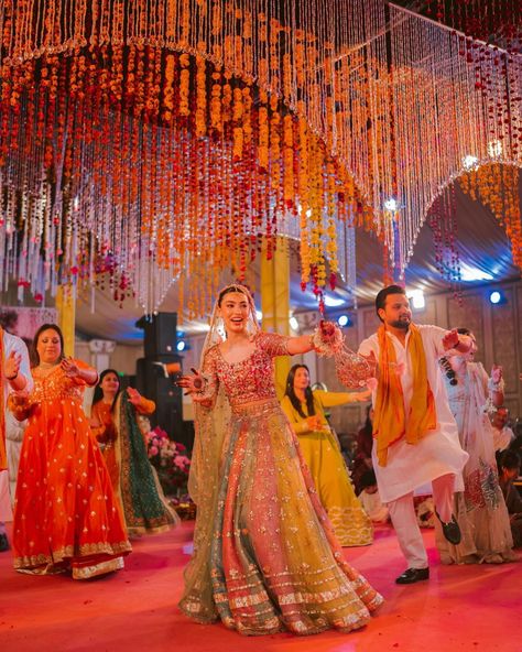 Gracing your feed with a dash of colour gleaming filled Sangeet night, stunningly captured by @sidishh_ . . . . Follow for more wedding inspiration @weddingbanquetsindia . . . Image credits - @sidishh_ @yasmiinekhn @isla.events @deenarahmanlahore @henna_by_shamsa . . . #sangeetnight #colour #bridesquad #bridetobe #pakistanwedding #pakistaniweddings #sangeet Colourful Sangeet Decor, Sangeet Aesthetic, Sangeet Photoshoot, Sangeet Entry, Sangeet Photography, Sangeet Dresses, Indian Wedding Sangeet, Indian Sangeet, Indian Wedding Aesthetic