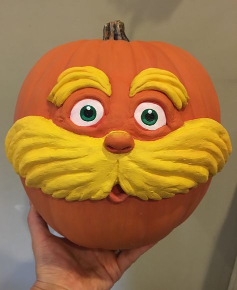 The Lorax pumpkin decoration with apoxie clay and acrylic paint. The Lorax Pumpkin Carving, The Lorax Pumpkin Ideas, Lorax Pumpkin Painting, Frog Pumpkin Painting, The Lorax Pumpkin, Lorax Pumpkin, Funny Pumpkin Painting Ideas, Storybook Decor, Book Pumpkins