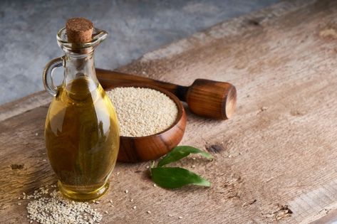 Sesame oil in glass bottle and sesame se... | Premium Photo #Freepik #photo #food #nature #spa #bottle Healthy Vegetable Salad, Soybeans Plant, Paneer Masala Recipe, Nature Spa, Fish Snacks, Hawaiian Dishes, Dried Dates, Healthiest Seafood, Corn Plant