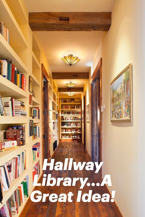 A hallway is a great place to create a library. The built in shelving and textural beams as well as ambient lighting create a rustic atmosphere. #homelibrary #hallwaylibrary #hallwaydesignideas Hall Library Bookshelves, Hallway With Bookshelves, Hallway Library Ideas Narrow, Built In Bookshelf Hallway, End Of Hallway Bookcase, Hallway Bookcase Ideas, Built In Shelves Hallway, Hallway Library Ideas, Library Lights On Bookcase