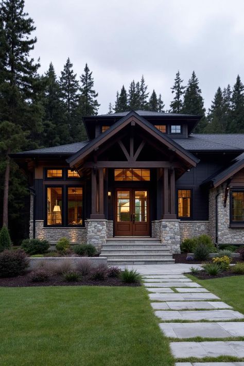 Modern craftsman house with stone and wood accents in a forest setting. Check out these charming modern craftsman houses, where timeless elegance meets today’s sleek simplicity. Modern Craftsman House, Modern Craftsman Home, Craftsman House Designs, Mountain House Design, Forest Houses, Craftsman Houses, Wooden Garage Doors, Cabin Modern, Forest Setting