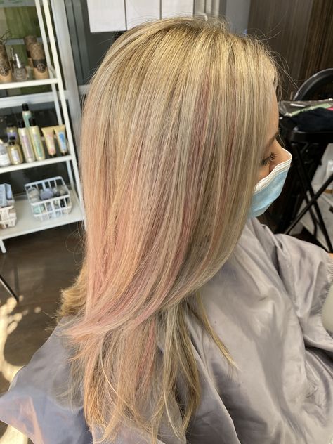 Soft blonde with ribbons of subtle pink. Light Pink And Blonde Hair Highlights, Light Pink Money Piece Hair Blonde, Blonde With Subtle Pink, Light Pink In Blonde Hair, Blonde W Pink Highlights, Subtle Pink Highlights Blondes, Blonde Hair Brown Streaks, Blonde With Light Pink Highlights, Light Pink Streaks In Blonde Hair