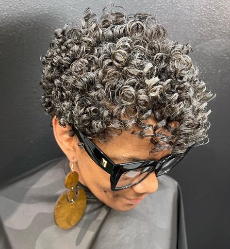 Short Curly Salt-and-Pepper Pixie with Defined Curls Pixie Cut Curly Hair, Pixie Cut With Highlights, Curly Perm, Curly Pixie Cut, Tiny Curls, Wavy Pixie Cut, Short Permed Hair, Wavy Bangs, Curl Enhancer