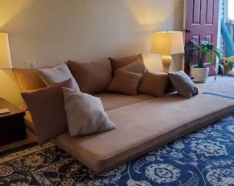 Low Table For Sitting On The Floor, Arab Floor Seating, Low Sitting Living Room Ideas, Low Floor Seating Living Rooms, Boho Floor Seating Living Room, Arabic Floor Sofa, Floor Living Room Seating, Low Living Room Seating, Living Room Without Couch