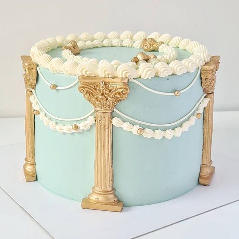 Corinthian columns (cast in chocolate) and cherubs for this one 💙 Lotus Cake, Greek Cake, Bakery London, Corinthian Columns, Vintage Sweets, Chocolate Diy, Basic Cake, Pretty Dessert, Diy Baking