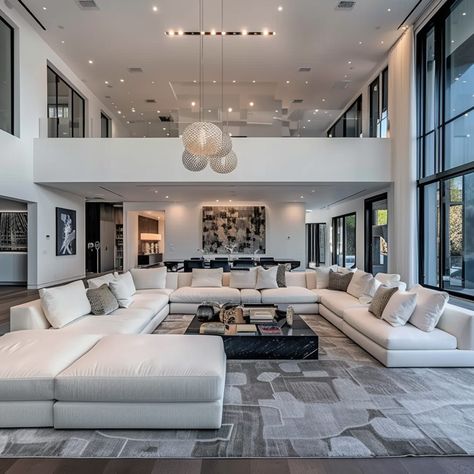 Luxurious Living Room in Jake Paul's Calabasas Mansion Regular Living Room, Modern Mansion Living Room, High Ceiling Windows, White Sectional Sofa, Mansion Living Room, Family Lounge, Spacious Sofa, Large Sectional Sofa, White Sectional