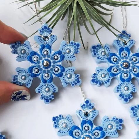 Personalized Hand Painted Light Blue and Silver Mandala Wooden Snowflakes Christmas Tree Ornaments Embelished with Gems and Resin Finish | One of a Kind by 'EvArtes ©️ | #christmasornaments #christmasgifts #mandalaornament #snowflakeornament #MiniSnowflakes #blueandsilver #winter #MiniMandalaArt #Christmasdecor #Christmas2024 #stockingstuffers #giftidea #christmastree #StockingFillers #familygifts #snowflowersign #winter #garland #gifttags #mandalapendant #hangingdecor #etsygifts #woodenbaubles Painted Wooden Snowflakes, Festival Tree, Mini Snowflakes, Painted Snowflakes, Dot By Dot, Mandala Ornaments, Mandala Dot Painting, Christmas Mandala, Winter Garland