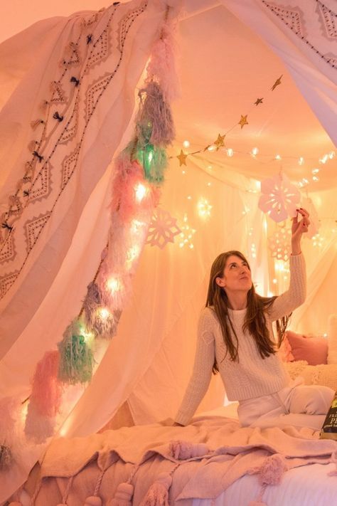 How To Make A Magical Holiday Tent at Home | studiodiy.com Kids Tents Indoor With Lights, Make A Tent With Sheets, The Holiday Tent, Play Tent Decorating Ideas, Indoor Tent Ideas, Bedroom Tent Ideas, Indoor Tent For Kids Sleepover, Indoor Tent Romantic, How To Make A Tent