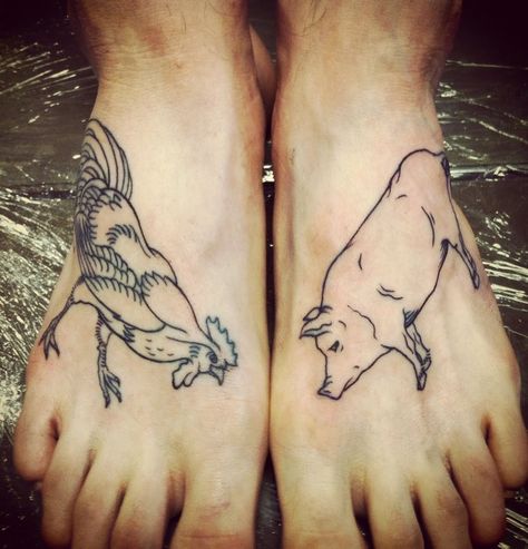 Pig & Rooster → (on the feet or behind the ankles) traditionally believed to symbolize survival from a shipwreck. As both animals were often kept in wooden crates on board, when a ship capsizes, these crates would float with the current and most likely get washed up to shore. Another explanation (pig tattooed on the left knee and a rooster on the right foot) was that "“Pig on the knee, safety at sea. A cock on the right, never lose a fight." Luck Tattoos, Survival Tattoo, Chicken Tattoo, Rooster Tattoo, Pig Tattoo, Sailor Tattoos, Sailor Tattoo, Matching Couple Tattoos, Book Tattoo