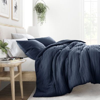 Indulge in the epitome of comfort with our exquisite 3 piece Waffle Textured Comforter set. Its polyester fill ensures a dreamy sleep experience, while the Soft Pre-Wash Finish and Double-Brushed fabric provide a luxurious touch. Plus, its oversized dimensions are perfect for extra deep mattresses. Elevate your sleep sanctuary today and embrace the ultimate in cozy sophistication. | Ebern Designs All Season Polyester Down Comforter blue/navy 70.0 x 90.0 x 4.0 in | C110157398 | Wayfair Canada Textured Comforter, Bedding Full, Bedding Twin, Sleep Sanctuary, Comforter Bedding Sets, High Quality Bedding, King Pillows, Down Comforter, Soft Bedding