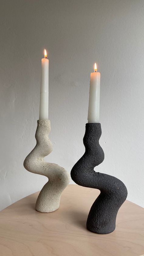 Set 2 White and Black Modern Ceramic Candle Holder This ceramic candlestick is made from with stoneware clay using hand building techniques. White and black glaze are used. DIMENSIONS : 7.6'' (19,5cm) x 3.9'' (10 cm)    MATERIALS     : Stoneware Ceramic, Glaze * Suitable up to 2,2 cm in diameter. * It is 2 pieces. Aysun Ay is a designer living in Istanbul. She works with stoneware clay bodies using hand building techniques. Having an architectural background, Aysun explores for the conceptual re Clay Candlestick, Beige Candles, Architectural Background, Clay Candle Holders, Clay Bodies, Clay Candle, Clay Works, Beige Ceramic, Hand Building