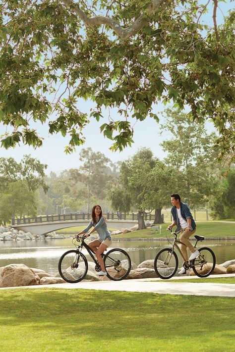 Surrounded by rows of shaded trees, William Mason Regional Park offers the perfect place to take a stroll or bike ride on a warm summer day. #VillagesOfIrvine #Hiking #Biking People At The Park, People In Park, Park Activities, Park Date, Summer Bike, Park Life, Park Day, Family Park, Resort Architecture