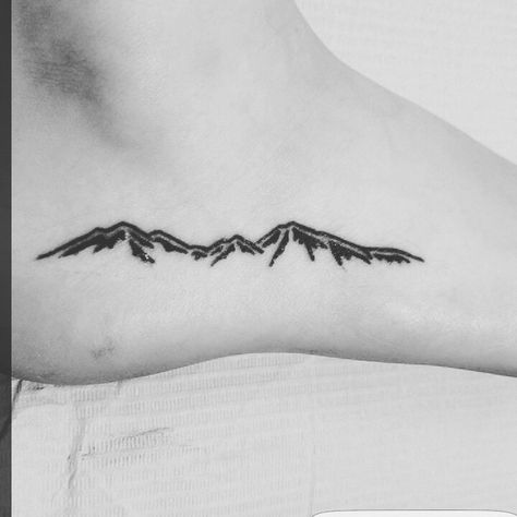 Mountain tattoo on the side of my foot! Cascade Mountains, WA, US. Three Fingers Mountain. Mount Pilchuck. Smoky Mountains Tattoo Ideas, Small Mountain And Water Tattoo, Mountain Tattoo Ankle, Cascade Mountains Tattoo, Smoky Mountains Tattoo, Ankle Mountain Tattoo, Mountain Range Ankle Tattoo, Mountain Feet Tattoo, Smokey Mountain Tattoo