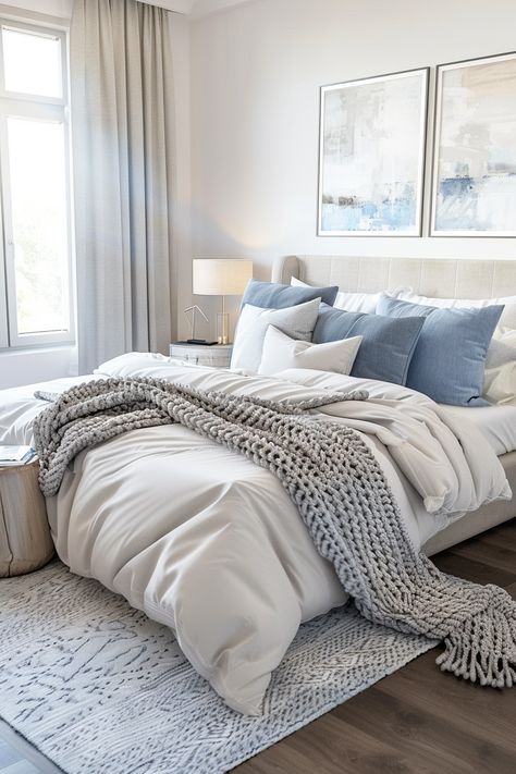 Create a Tranquil Bedroom Oasis: Stylish Decor & Serene Color Palettes Neutral Bedding Blue Accent, Light Blue Walls Gray Bedding, Grey Bed Blue Bedding, Grey And Blue Bedding Ideas, Blue Accent Master Bed, Blue Grey Comforter Bedroom, Blue White And Beige Bedroom, Blue Gray And Tan Bedroom, Bedroom With Hints Of Blue