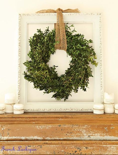 Decorating with empty picture frames can be a great way to add a little personality and interest to your decor without spending much money at all. Empty Picture Frames, Christmas House Tour, Empty Frames, Boxwood Wreath, The Mantle, Green Wreath, Farmhouse Dining Room, Pretty Green, Noel Christmas