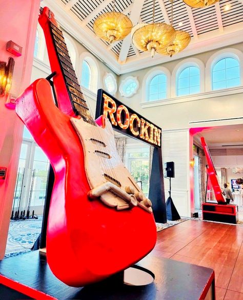 Striking chords and neon lights! 🎸✨ Dive into the rock and roll rhythm with our electrifying setup. #redguitar #rocknroll #rocknrolltheme #rockandrolltheme #rockandroll #rockin #rockandrollevent #lightupsign #eventdecor #rocktheme #musictheme #musicevent #florida Red Guitar, Rock Of Ages, Light Up Signs, 80s Party, Event Themes, Music Event, Neon Lights, Rock N, Summer Camp