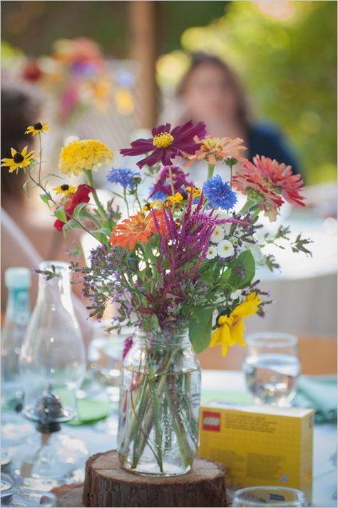 colorful wildflower centerpiece #weddingreception #wildflowers #weddingchicks http://www.weddingchicks.com/2014/02/26/fun-and-feisty-forest-wedding/ Wildflower Centerpieces, Wedding Centerpieces Mason Jars, Rustic Boho Wedding, Unique Wedding Flowers, Mason Jar Wedding, Wildflower Bouquet, Flower Centerpieces Wedding, Wildflower Wedding, Wedding Table Centerpieces