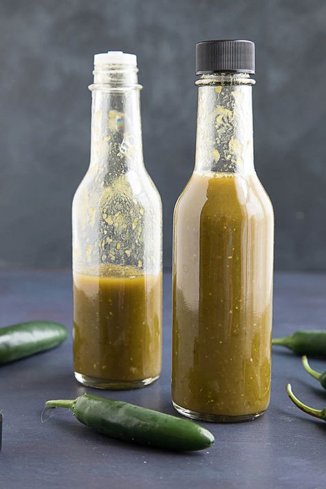 icy Serrano Hot Sauce Recipe - This hot sauce recipe uses serrano peppers that have been fermented, then processed with vinegar, garlic, tequila and lime juice. It is juicy, tart and just the right amount of spicy. | ChiliPepperMadness.com #HotSauce #Recipe #Serrano #Peppers #SpicyFood Homemade Hot Sauce, Hot Pepper Seeds, Serrano Hot Sauce Recipe, Serrano Pepper Recipes, Serrano Hot Sauce, Hot Pepper Recipes, Hot Sauce Recipe, Chili Pepper Recipes, Pepper Sauce Recipe