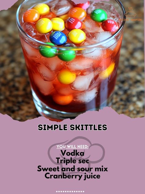 Taste the rainbow in a glass! This fun and fruity cocktail will brighten up any party. 🍹✨ #ColorfulCocktails #FruityFun Simple Skittles Ingredients: Vodka (1 oz) Triple sec (1 oz) Sweet and sour mix (1 oz) Cranberry juice (1 oz) Sprite (1 splash) Skittles candy (for garnish) Ice cubes (as needed) Instructions: Mix vodka, triple sec, sweet and sour mix, and cranberry juice in a shaker with ice. Shake and strain into a glass. Top with a splash of Sprite and garnish with Skittles. 🌈🍭 This Si... Skittles Cocktail, Skittles Shot, Skittle Vodka, Classy Drinks, Skittles Candy, Bartender Drinks Recipes, Fruity Cocktail, Bartender Drinks, Pretty Alcoholic Drinks