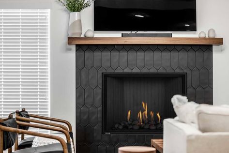 Fireplace Design Ideas that Will Inspire You | Montigo Black Subway Tile Fireplace Surround, Dark Fireplace Tile, Black Herringbone Fireplace Surround, Black Tiled Fireplace Wall, Dark Wood Fireplace Mantle, Peal And Stick Fireplace Tile, Black Chevron Fireplace, Picket Tile Fireplace, Tile And Shiplap Fireplace