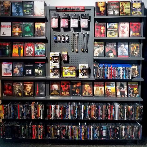 Horror Movie Shelf, Horror Movie Theater Room, Movie Shelf Aesthetic, Movie Collection Display, Diy Dvd Shelves, Comic Shelf, Dvd Wall, Movie Shelf, Diy Reclaimed Wood Wall