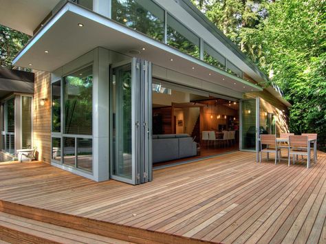 Your deck project is just about ready to roll, so browse these custom deck options for inspiration. Folding Patio Doors, Glass Wall Systems, Sliding Doors Exterior, Balkon Decor, Folding Glass Doors, Wooden Deck, French Doors Patio, Door Interior, Sliding Glass Doors