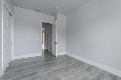 Grey Flooring White Walls, Light Grey Walls Flooring, Grey Bedroom Floor, Flooring With Light Gray Walls, Grey Wood Floors Wall Color, Grey Flooring Beige Walls, White Wall Grey Floor, Grey Flooring Wall Paint Ideas, White Grey Walls