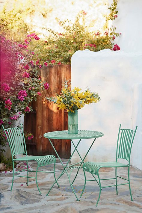 Crafted from durable iron and finished with a powder coating, this set of two dining chairs arrives in an array of cheerful hues. We love it paired with a classic teak table for a pop of color or at a bistro table for easy outdoor dining. | Arcadia Steel Side Chairs, Set of 2 in Mint at Terrain Bistro Table And Chairs, Cottage Backyard, Outdoor Dining Chair Cushions, Outdoor Furniture Covers, Luxury Outdoor Furniture, Outdoor Living Decor, Beach Read, Outdoor Cafe, Teak Table