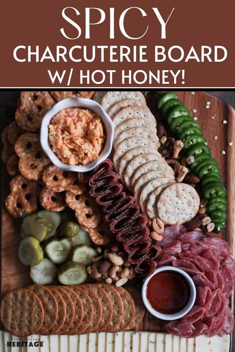 Hot honey is having a moment and it found its way on this spicy charcuterie board! Aside from the hot honey, this board has peppered salami, spicy pickles, pimento cheese, jalapeños, and more. Keep a glass of water nearby and dive in! See the blog for step by step instructions on recreating this charcuterie board. Spicy Charcuterie Board, Peppered Salami, Seasoned Nuts, Pretzel Thins, Best Pickles, Spicy Pickles, Salted Nuts, Spicy Cheese, Pickle Slices