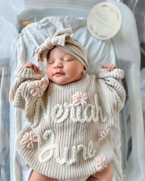 Little Miss 🤍🤍Neriah June🤍🤍 is completely PRECIOUS all snuggled in her custom sweater!! Such a perfect blessing with the most beautiful face. Welcome to the world, sweet angel!!! #themodmango #themodmangobabyco #babysweater #babynameannouncement #newborngift #newborngiftideas #babygirlsweater #newbornsweater #milestonesweater #handembroidery #handembroidered #custombabyboutique Embroider Baby Sweater, Baby Girl Announcement Outfit, Baby Going Home Outfit Girl, Newborn Going Home Outfit Girl, Going Home Outfit For Baby Girl, Baby Sweater With Name, Embroidered Baby Sweater, Newborn Hospital Outfit, Sweater With Name