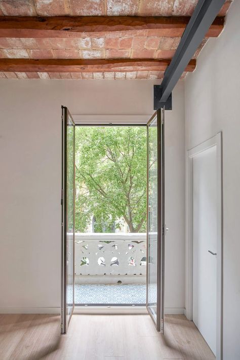 75 square meters, the center of the Eixample district in Barcelona, first floor with an elevator. The property that was intended for sale was presented to the studio half-naked with exposed concrete walls, just the place to start imagining. A very typical division for local construction, kitchen in a closed room, one bathroom, a space that wants to be a bedroom and small room without a window. #architecture #architect #amazingarchitecture #design #interiordesign #interiordesigner #homedecor Residential Architecture, Apartment Barcelona, Window Architecture, Barcelona Apartment, Concrete Walls, Exposed Concrete, Apartment Aesthetic, Concrete Wall, Residential Building