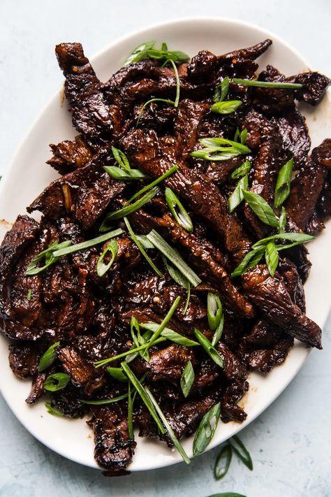 Crispy, delicious beef infused with intense flavors—this bulgogi beef recipe stands apart from the crowd. Marinate overnight, and let your grill do the rest! Roast Beast, Best Grill Recipes, Soy Sauce Marinade, Korean Bbq Beef, Cucumber Kimchi, Vietnamese Sandwich, Bulgogi Recipe, The Modern Proper, Modern Proper