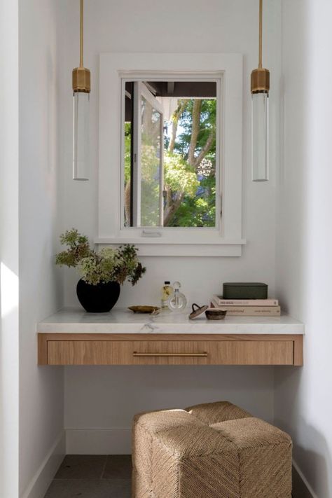 The Ainsley Stool from the @kirk_nix collection adds natural texture and comfort to this vanity nook. Its low profile makes it the perfect complement to small spaces where it can be easily tucked away when not in use.  #Palecek // @kirk_nix Collection // Design: @emerson.gracedesign // Photography: @jessicabrydsonphotograph Oak Makeup Vanity, Built In Makeup Vanity Ideas, Nook Vanity, Built In Makeup Vanity, Vanity Nook, Dining Table Lighting, Chandelier Table Lamp, Vanity Ideas, Primary Bedroom