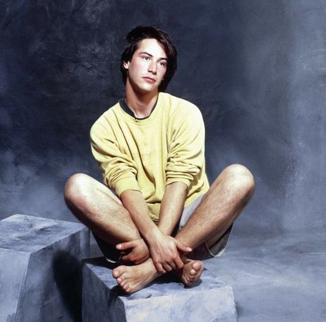 This slideshow features photos of handsome young Keanu Reeves, who first made waves in Hollywood with his performances in the 1980s films Bill and Ted’s Excellent Adventures, followed by successful movies like Point Break, Speed, The Matrix film series, A Scanner Darkly, and My Own Private Idaho. H... #celebrityphotos Matrix Film, Keanu Reeves Young, Arch Motorcycle Company, 1980s Films, Sitting Cross Legged, Jacqueline Bisset, Donald Sutherland, Keanu Charles Reeves, Hugh Laurie