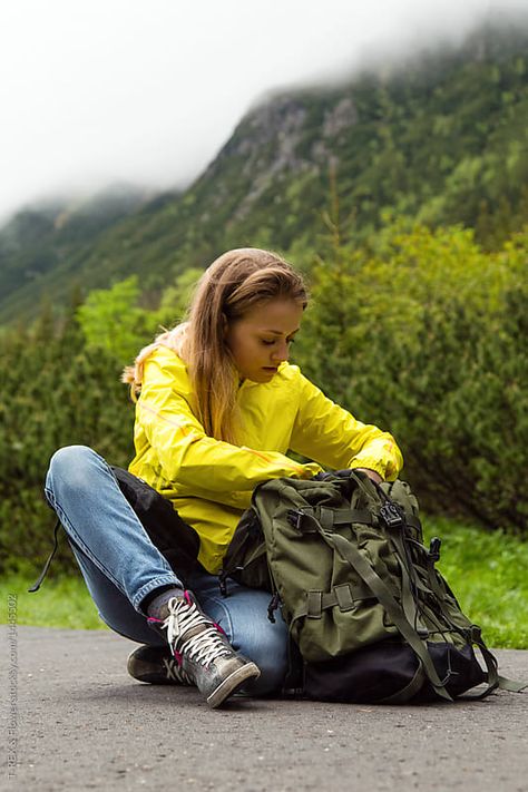 Woman sitting and searching in backpack by T-REX & Flower for Stocksy United Holding Backpack Reference Drawing, Backpack Pose Reference Drawing, Person With Backpack Reference, Person Wearing Backpack, Backpack Pose, Pose With Bag, Backpack Reference, Bag Poses, Wearing Backpack