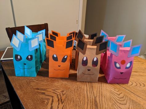 Pokemon Eevee Evolution Party Eevee Party Ideas, Eeveelutions Birthday Party, Evee Birthday Party, Eevee Evolutions Birthday Party, Eeveelution Birthday Party, Evee Evolution Birthday Party, Eevee Party Decorations, Eevee Birthday Decorations, Eevee Birthday Party