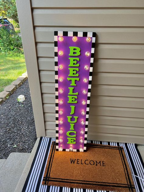 Beetle Juice Halloween Sign. This absolute show stopper comes with 24 G40 lights and is sure to have you ready for spooky season! Can be used at your front door, as a porch leaner, entryway decor or for any Beetlejuice themed party this year.  Height is approximately 44".  Please note this item is handmade to order and size may differ by up to 1 inch. All sales to Alaska will be charged a shipping fee, this is due to the high shipping rates. RETURNS We do not accept returns but please notify us Its Showtime Beetlejuice Sign, Lamp Post Halloween Decor, Beetle Juice Office Decorations, Beetle Juice Sign, Beetlejuice Door Sign, Beetlejuice Door Decor, Beetlejuice Porch Decor, Bettle Juice Trunk Or Treat, Office Door Decorating Contest Halloween