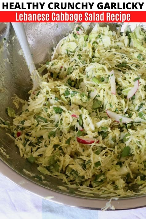 Learn how to make the best homemade Malfouf Salad. Our quick & easy Lebanese Cabbage Salad recipe is a popular side dish at Middle Eastern restaurants. Enjoy a taste of Beirut by preparing this healthy salad at home, which is vegetarian, vegan, gluten free and dairy free. The Lebanese coleslaw features thinly sliced cabbage, scallions, radish, fresh herbs and a garlic lemon dressing. Serve with falafel, kibbeh, dips and spiced grilled meats. Cabbage Salad Lebanese, Lebanese Coleslaw Recipe, Russian Cabbage Salad, Middle Eastern Cabbage Salad, Middle Eastern Salads Lebanese Recipes, Creamy Cabbage Salad, Lebanese Slaw Recipe, Lebanese Cabbage Salad, Cabbage Leaf Recipes