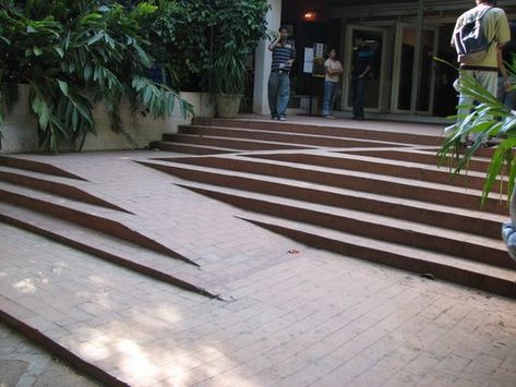 excellent design for wheelchair access on stairs Alliance Francaise de Bangalore 121007 Wheelchair Ramp Design, Urban Plaza, Ramps Architecture, Parking Plan, Tropical Contemporary, Ramp Stairs, Landscape Stairs, Ramp Design, Wooden Deck