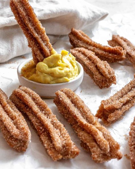 These easy Vegan Churros are a well-loved dessert with both vegans and non-vegans! Each churro is deep-fried until crisp and golden brown, then coated in cinnamon sugar and served with melted chocolate or vegan custard for dipping. Vegan Churros, Vegan Custard, Plant Based Dessert Recipes, Chocolate Dipping, Chocolate Dipping Sauce, Healthy Vegan Desserts, Mexican Hot Chocolate, Vegan Ice Cream, Melted Chocolate