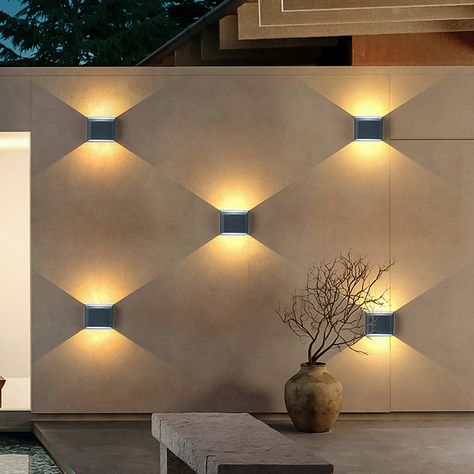 The upper and lower ends are symmetrically illuminated, forming a unique and beautiful light and shadow, so that the outdoor lighting is not monotonous, which adds light to your outdoor walls and adds a chic decoration. The light from this wall sconce is bright but not harsh. The combined installation of multiple wall lamps can achieve unique layout effects, and you can even DIY your own desired lighting effects. The aluminum lamp body is wear-resistant and durable, and the junction of ... Vogue Decor, Blitz Design, Porch Light Fixtures, Outdoor Lighting Design, Decorative Wall Sconces, Wall Lighting Design, Exterior Wall Light, Led Outdoor Wall Lights, Led Outdoor Lighting