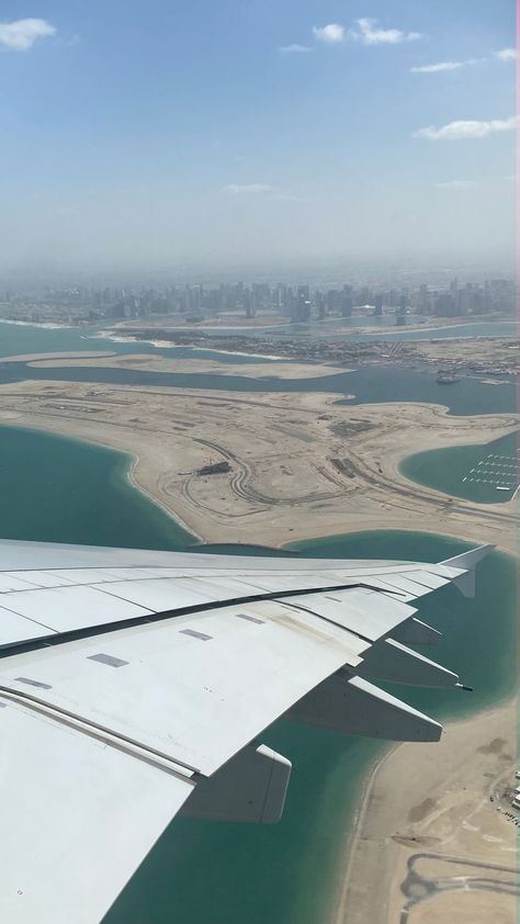 plane view from a plane flying over dubai. there are high rise buildings in the background. Plane Window View, Plane View, Travel Dubai, Dubai Skyline, Plane Window, Dubai Vacation, Dubai Travel, By Plane, Window View