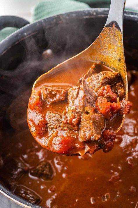 This texas chili recipe will be a crowd pleasing favorite! Tender stew meat cooked with smoky, savory spices, without beans is delicious and easy to make. Chili Recipe Texas Style, Beef Chili Without Beans, Chili Recipe Using Stew Meat, Beef Stew Chili Recipe Crockpot, Beef Tips Chili Recipe, Beef Cube Chili Recipe, Chili With Stew Meat And Ground Beef, Chili With Stew Meat Crock Pots, Chili Recipe Beef Steak