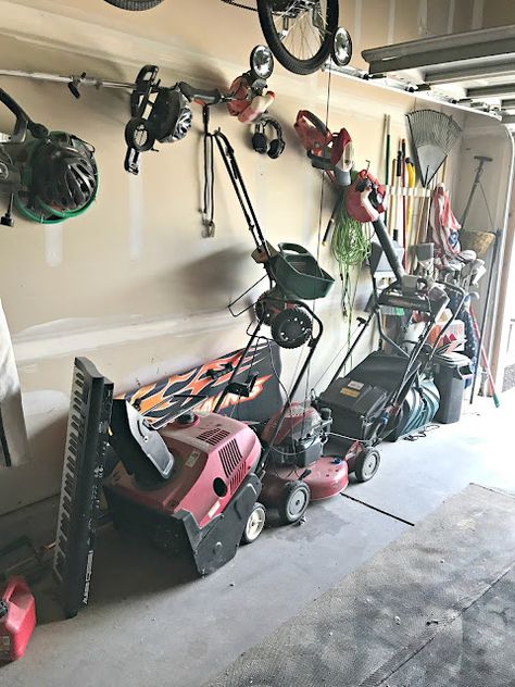 How To Store Chairs In Garage, Garage Storage For Lawn Equipment, Garage Yard Tool Storage, Lawn Tools Storage Ideas, Lawnmower Garage Storage, Diy Rake And Shovel Holder, Organize Lawn Equipment In Garage, Garage Organization For Lawn Equipment, Garage Organization Ideas Lawn Equipment