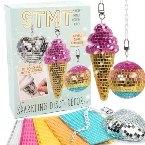 PRICES MAY VARY. GET INTO THE GROOVE: This DIY disco ball decor set comes with everything you need to create 3 shiny accessories in just 5 easy steps! Pick a 3D figurine, design your pattern, peel & stick on mirrored tiles, connect to chains & display! 3 FAR-OUT ACCESSORIES: Turn a lightweight disco ball, ice cream cone, and heart into aesthetic decor or accessories that can hang anywhere and never lose their sparkle! Perfect for display in dorms! 7 SPARKLING, COLORFUL TILE SHEETS: The adhesive Ice Cream Cone Aesthetic, Disco Ball Craft, Y2k Party Decorations, Cone Aesthetic, Heart Ice Cream, Shiny Accessories, Mini Disco Ball, Diy Disco Ball, Disco Decor