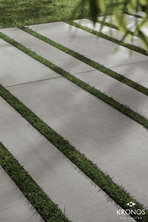 Outdoor design ideas: Dry installation with concrete look porcelain pavers. Collection by Kronos Ceramiche: Ske 2.0 Prima Materia Cemento (R11C) #kronostiles #kronosceramiche #madeinitaly #porcelaintiles #porcelainstoneware #gresporcellanato #grescerame #feinsteinzeug #porcelainpavers #luxurytiles #patiotiles #gardenareatiles #gardendesign #drylaying #outdoortiles #R11tiles #nonslipfloor #concretetiles #concretelook #greseffettocemento #betonoptik #architect Large Concrete Pavers, Grass Driveway, Porcelain Pavers, Pavement Design, Car Porch, Paving Ideas, Paver Designs, Outdoor Paving, Paving Design