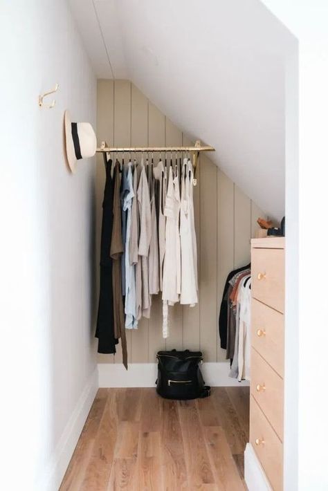 a tiny attic nook with railings for hanging clothes, a blush dresser and some hooks on the walls is awesome Cream Bed Covers, Small Attic Spaces, Small Attic Bathroom, Attic Nook, Clothes Shelves, Attic Closet, Tiny Closet, Small Attic, Im So Excited