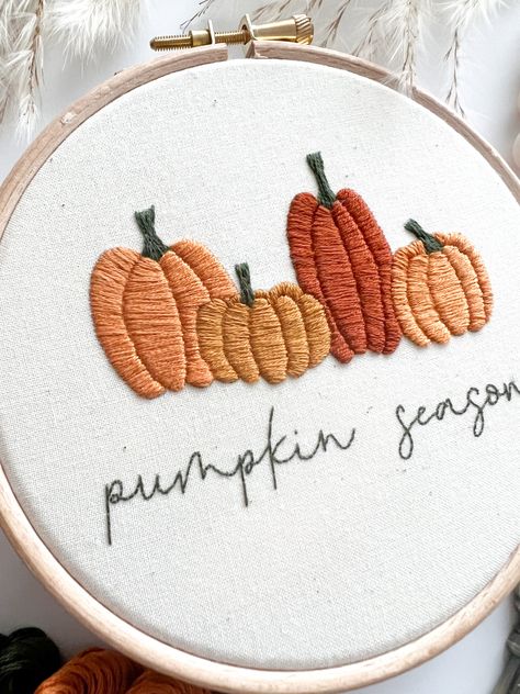 Pumpkin Season Digital Embroidery Pattern with Instructions I'm always inspired by the seasons, and this pattern is no different! With this intermediate 5" hoop, you can create some seasonal pumpkin goodness too.*Please Note: This is a PDF Digital Download that you can download after purchase. You will not receive a physical shipped product by purchasing this pattern.*This pattern has been created for a beginner to embroidery - no prior understanding of embroidery is required! With the Free Guid Halloween Hand Embroidery Patterns Free, Fall Embroidered Shirts, Pumpkin Embroidery Patterns Free, Hand Embroidery Pumpkin, Pumpkin Embroidery Designs, Autumn Embroidery Designs, Fall Embroidery Ideas, Halloween Embroidery Ideas, Pumpkin Embroidery Pattern